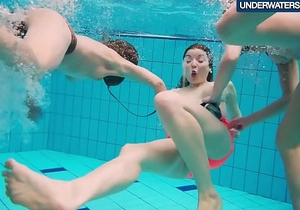 Three hot horny girls swim together